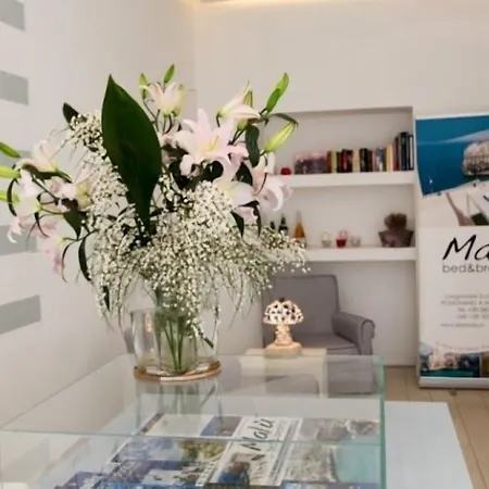 Couette-café Malù 4*